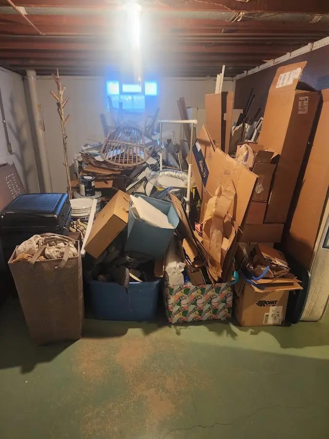 Roll-off dumpster container at job site for 15 Yard Dumpster Rental in Kaunakakai